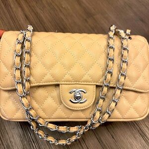 Chanel 11.12 bag with card and cloth bag.